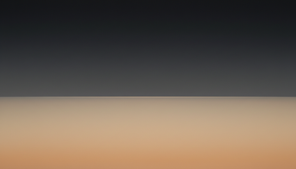 Minimalist horizon with a thin dividing line separating warm sand-colored light from a dark upper gradient.